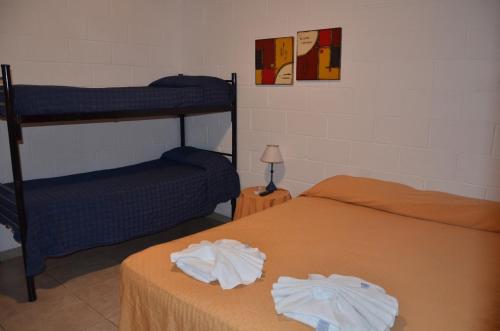 En eller flere senge i et værelse på GEMINIS