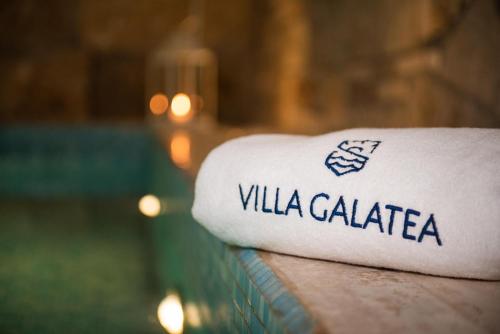 a white towel with the word villa caleta on it at Villa Galatea in San Vincenzo