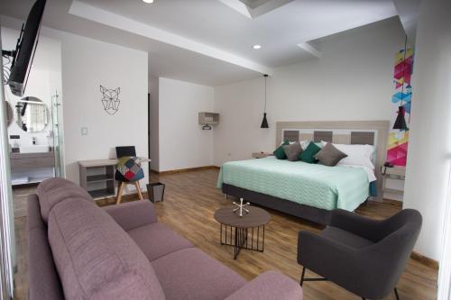 Postel nebo postele na pokoji v ubytování Hotel Aristo Gold