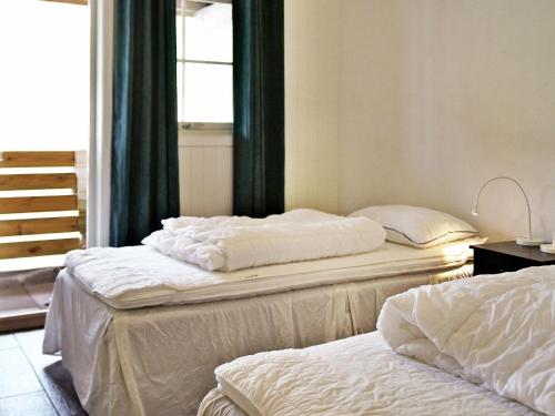 Postel nebo postele na pokoji v ubytování Holiday Home Leirvik