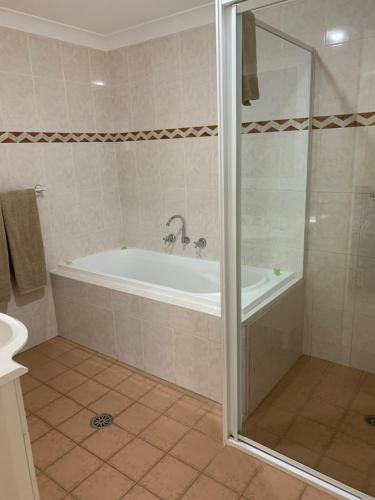 Ванна кімната в Bel Mondo Apartments