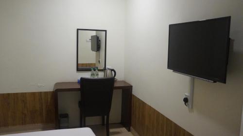 TV a/nebo společenská místnost v ubytování Be Boutique Hotel
