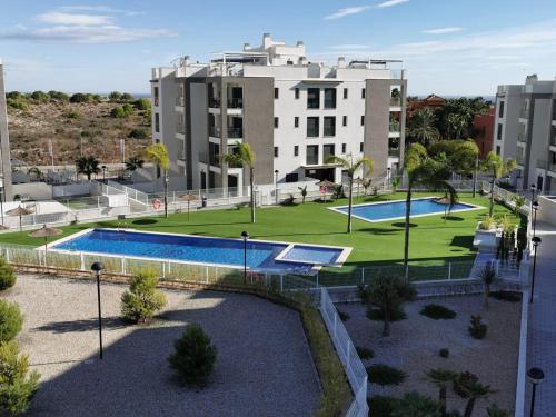 Bazén v ubytovaní Valentino golf penthouse bloque 2 no46 alebo v jeho blízkosti