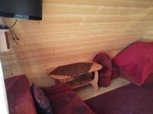 Een zitgedeelte bij Pokoje Ewka