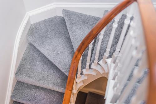 a set of stairs in a plastic box with a mirror at Great Gate House View, Micklegate near York Station in York