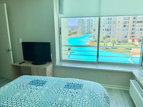 Ένα ή περισσότερα κρεβάτια σε δωμάτιο στο Departamento Laguna Vista Algarrobo - 7 Personas