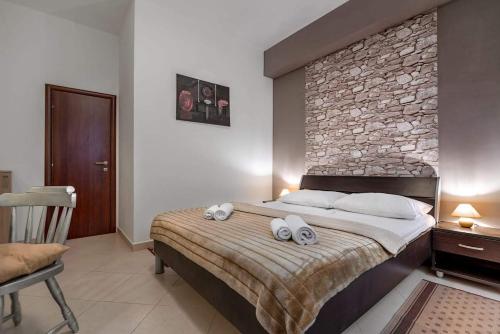 Postel nebo postele na pokoji v ubytování Casa Souni