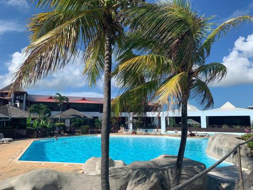 Appartement au village Manganao plage piscine