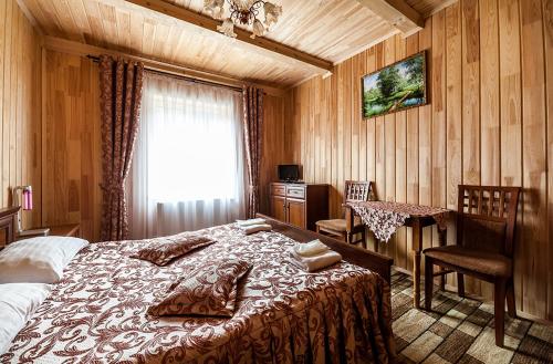 Ліжко або ліжка в номері Olga Hotel SPA