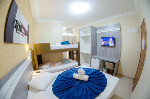 Tempat tidur dalam kamar di Villarejo Parque Hotel
