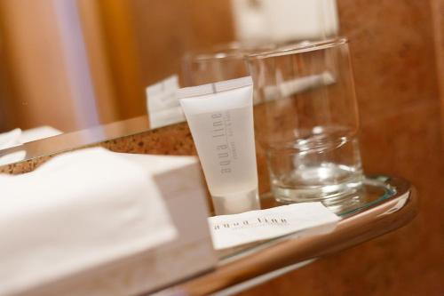 a table with two glasses on top of a counter at Pension Paseka in Litomyšl