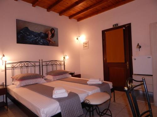 Postel nebo postele na pokoji v ubytování Classic seaside apartment in Tinos