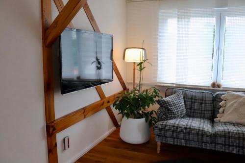 TV a/nebo společenská místnost v ubytování Green Caroline
