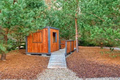 Tleń Lodge - domy całoroczne z jacuzzi w cenie!にある庭