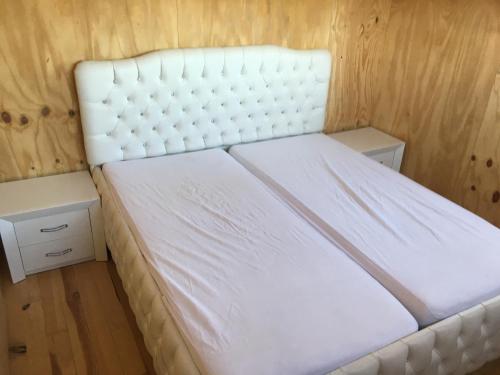 Postel nebo postele na pokoji v ubytování Einzigartiges Haus am Isselmeer