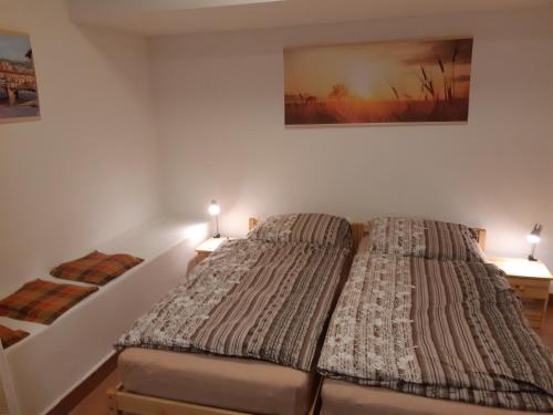 Postel nebo postele na pokoji v ubytování Studio Voluntário