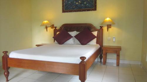 Letto o letti in una camera di Ubud Bungalow