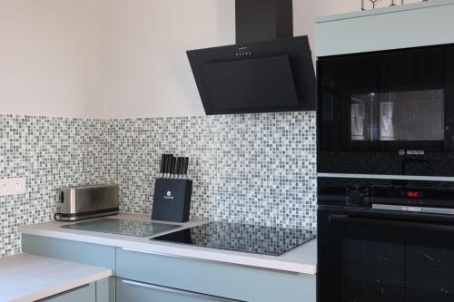 Dapur atau dapur kecil di Gite Chez Léa
