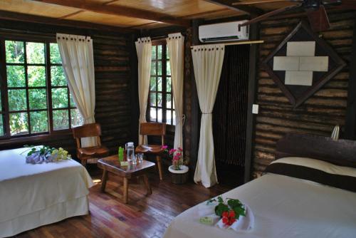 Postel nebo postele na pokoji v ubytování Hotel El Chital