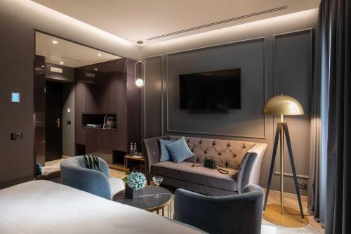 Гостиная зона в Hotel La Place Roma