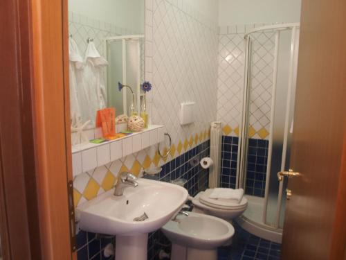 Ванна кімната в Residence I Girasoli