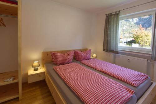 Ένα ή περισσότερα κρεβάτια σε δωμάτιο στο Arnspitzgarten