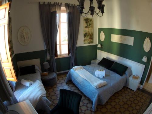 Cama o camas de una habitación en Villa San Donato B&B