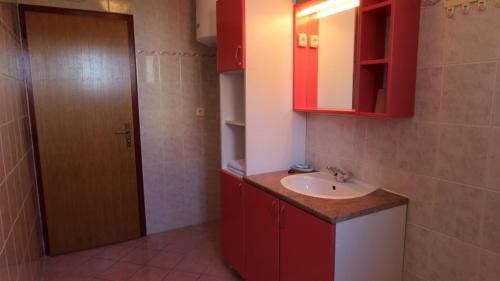 Kuchyň nebo kuchyňský kout v ubytování Apartments Miko