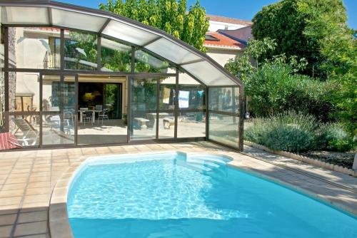 Appartement d'une chambre avec piscine partagee jardin amenage et wifi a Marseillan a 6 km de la pla