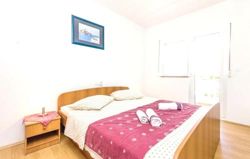 Postel nebo postele na pokoji v ubytování Comfortable apartment with garden in Palit, 100 m², for 6 guests.