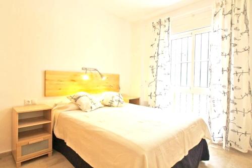Postelja oz. postelje v sobi nastanitve 2 bedrooms appartement with wifi at Malaga