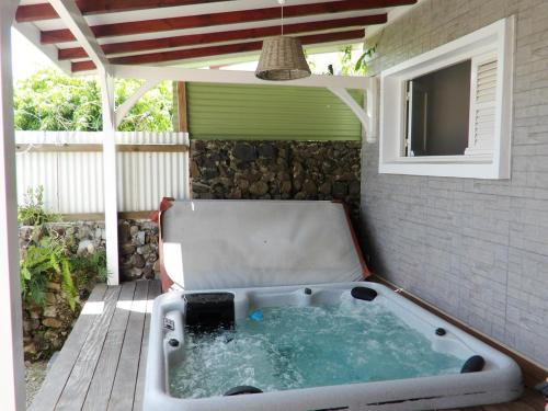 Φωτογραφία από το άλμπουμ του Appartement confortable au Vauclin avec jacuzzi - 55 m² σε Le Vauclin