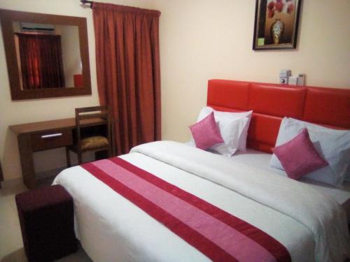 Katil atau katil-katil dalam bilik di RHOGEM Hotel