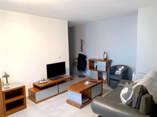 Posezení v ubytování Appartement de 2 chambres avec terrasse et wifi a Bagnolet