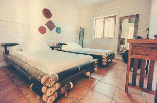 Cama o camas de una habitación en One bedroom house with shared pool furnished garden and wifi at Canamero