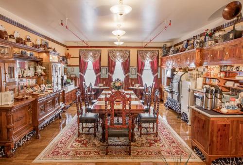 a dining room with a long table and chairs at The Edgewater Hotel in Orlando