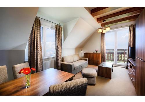 A seating area at Apartmanový Dom TatraTravel Smokovec