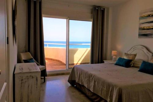 Posteľ alebo postele v izbe v ubytovaní PENTHOUSE BERMUDA BEACH 2