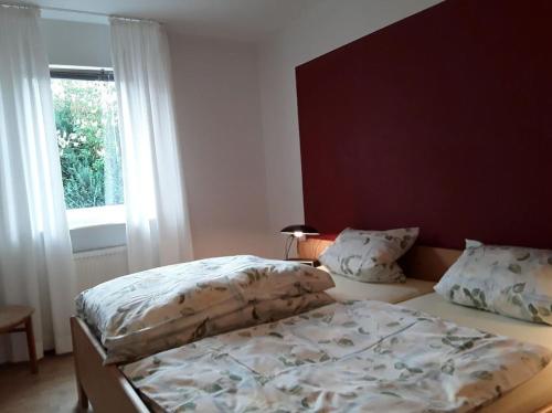 Katil atau katil-katil dalam bilik di Ferienwohnung am Rande Kassels