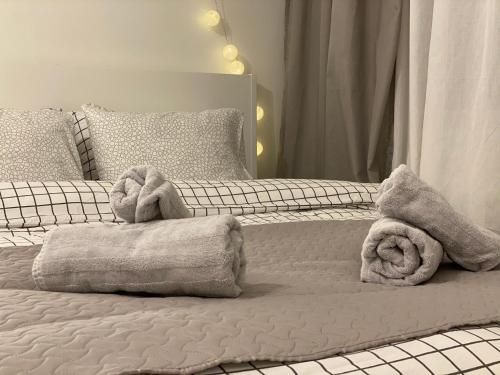 Кровать или кровати в номере Cosy&White apartment in Daugavpils
