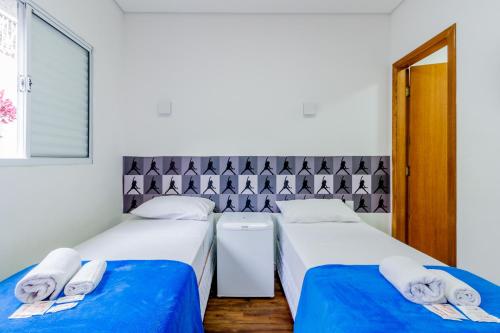 Krevet ili kreveti u jedinici u objektu Rock CGH Suites - Aeroporto de Congonhas