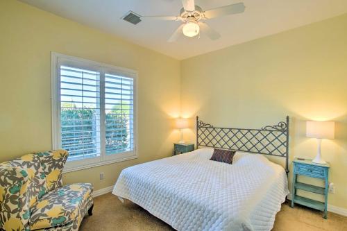 a bedroom with a bed and a chair and a window at Mtn-View Home with Pool in Fountain Hills in Fountain Hills