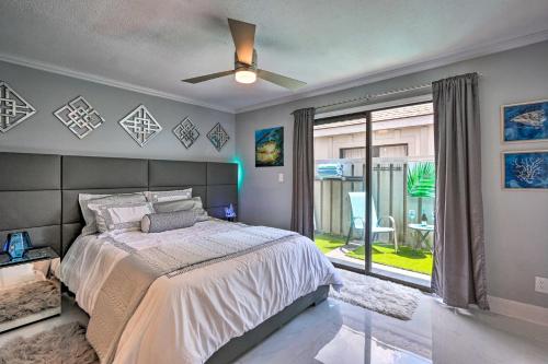 a bedroom with a bed and a ceiling fan at Coastal Resort Beach Villa - Short Walk to Shore! in Hilton Head Island