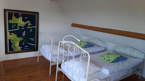 מיטה או מיטות בחדר ב-Bed en Boterham
