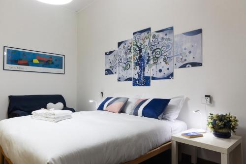 Postel nebo postele na pokoji v ubytování Albero Azzurro