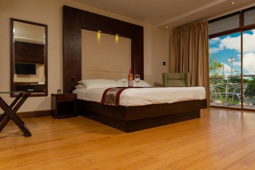 Voodi või voodid majutusasutuse Herdmanston Lodge Hotel toas