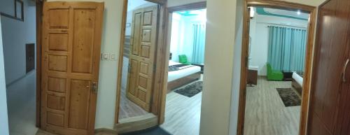 Cama o camas de una habitación en Hotel Sarla Regency