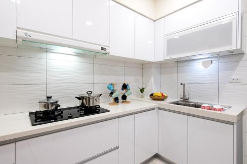 Kuchyň nebo kuchyňský kout v ubytování Xu Jia Homestay