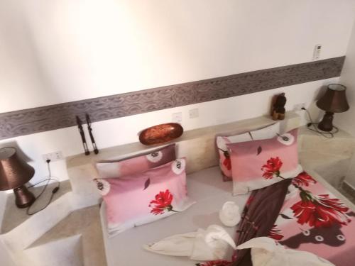 Ένα ή περισσότερα κρεβάτια σε δωμάτιο στο Peter Pan Beach Lodge