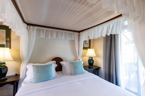 Letto o letti in una camera di Punyashthiti villa